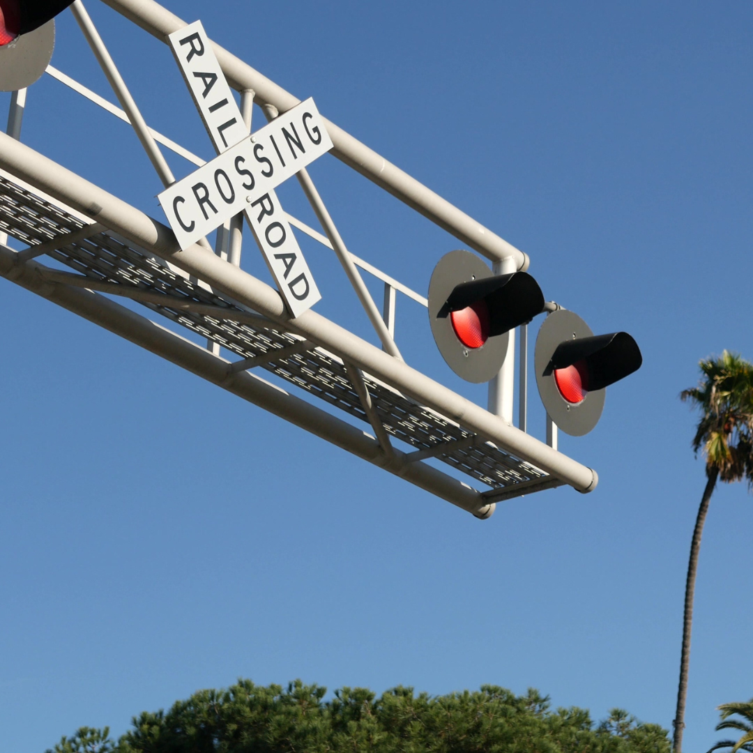 Railroad crossing sign with lights.